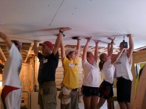 COVER working with Dreambuilders from Maryland in Hurricane Irene Repair